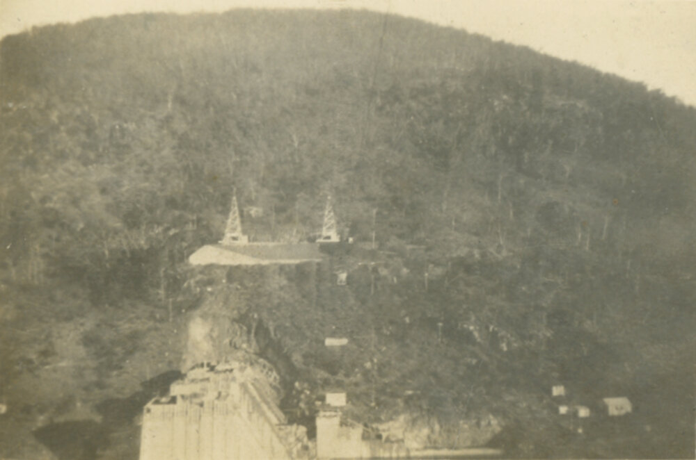 A view looking across the dam wall to the two towers 