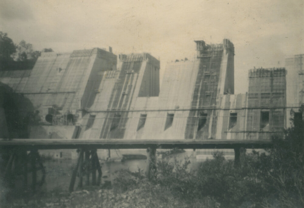 Somerset Dam wall with an old bridge in the foreground
