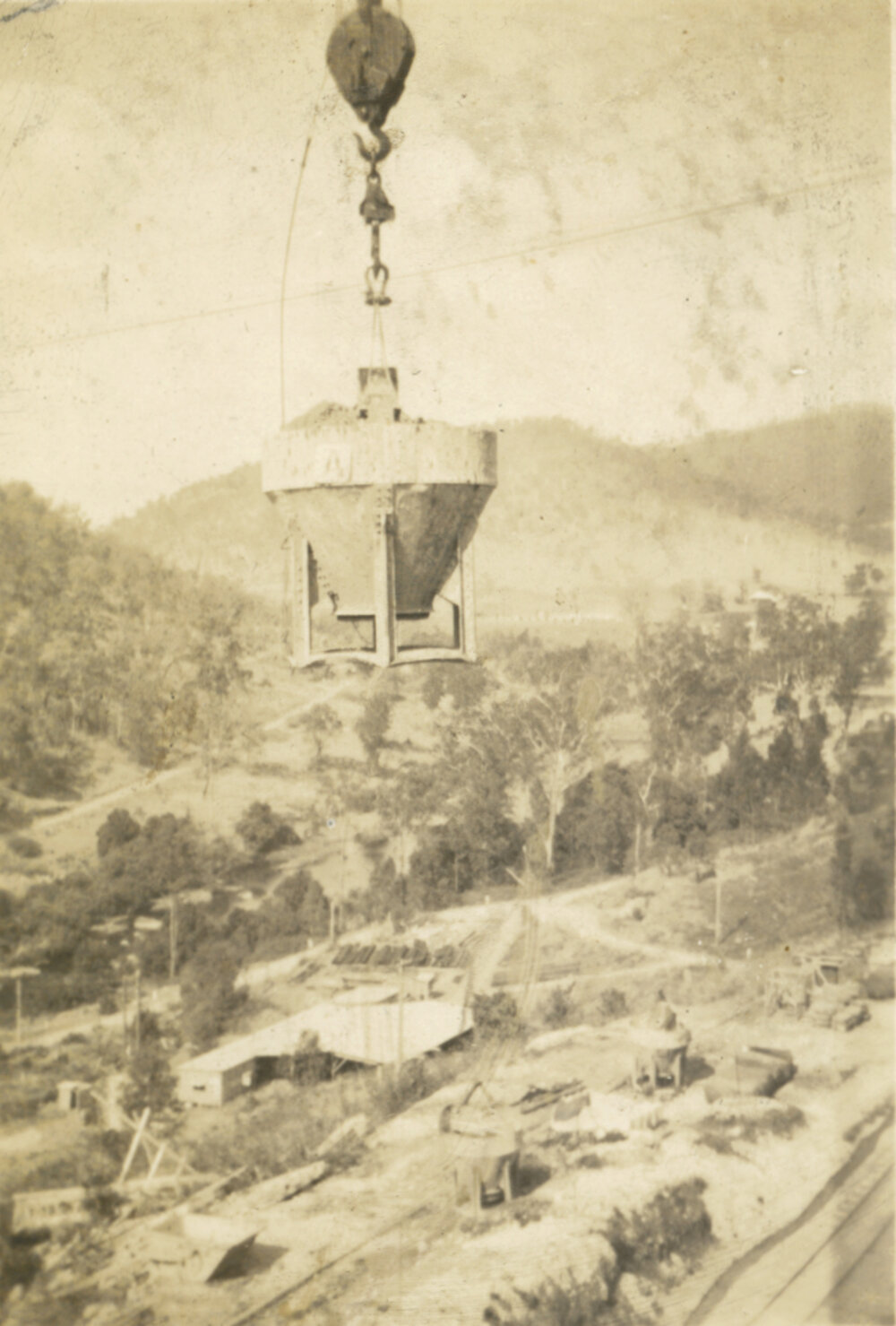 Concrete bucket on flying fox, Somerset Dam construction