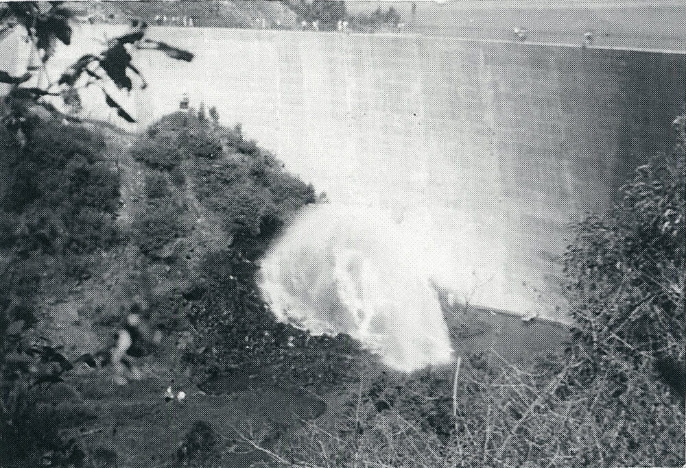 Valves at work as water gushes out of the pipes in the Somerset Dam wall