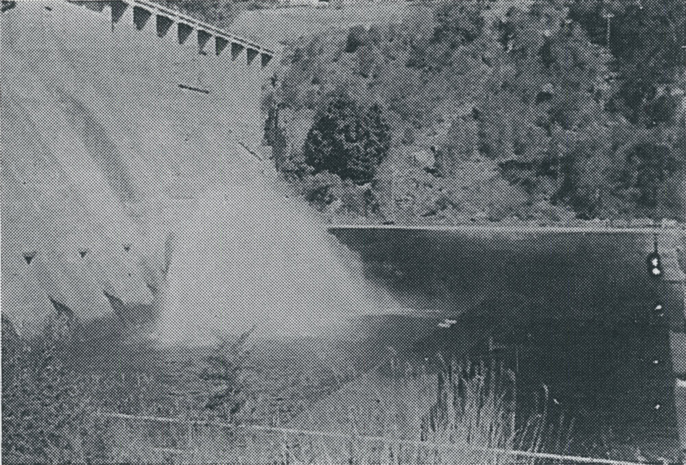 Valves at work as water gushes out of the pipes in the Somerset Dam wall