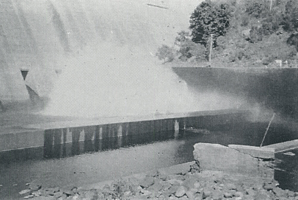 Valves at work as water gushes out of the pipes in the Somerset Dam wall