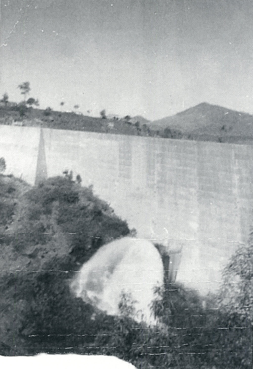 Valves at work as water gushes out of the pipes in the Somerset Dam wall