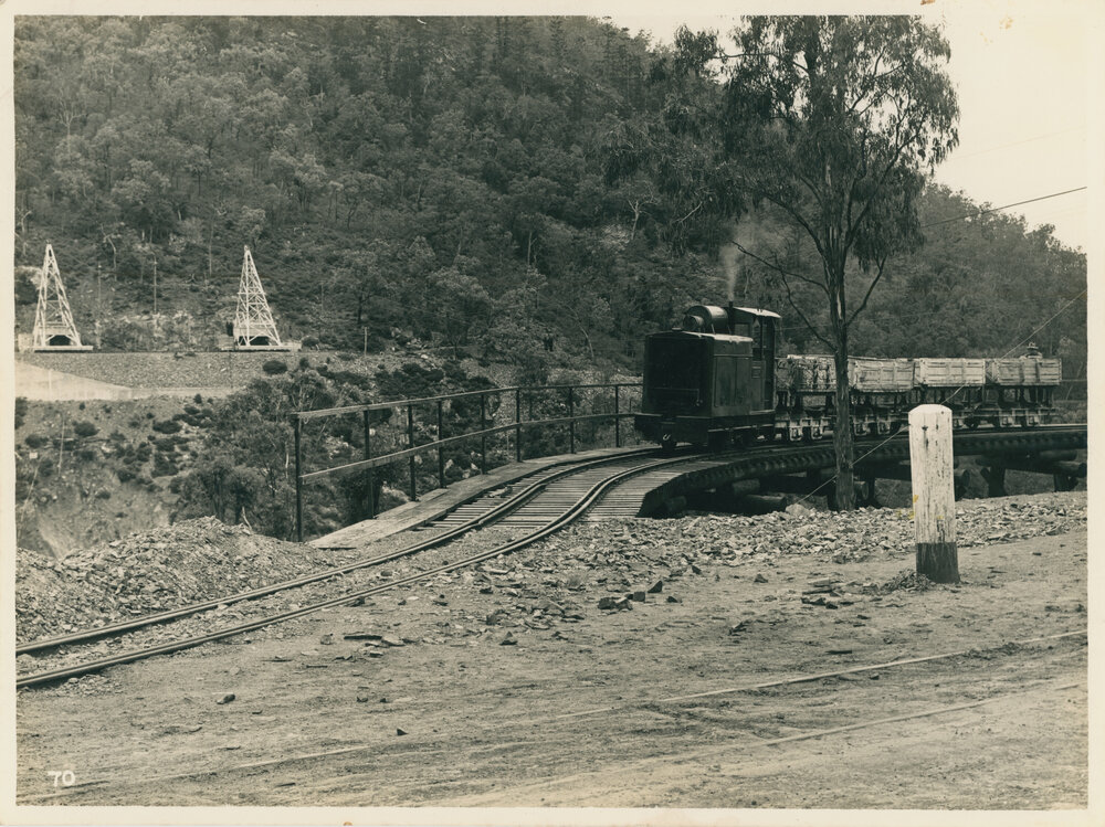 A locomotive hauling rocks 