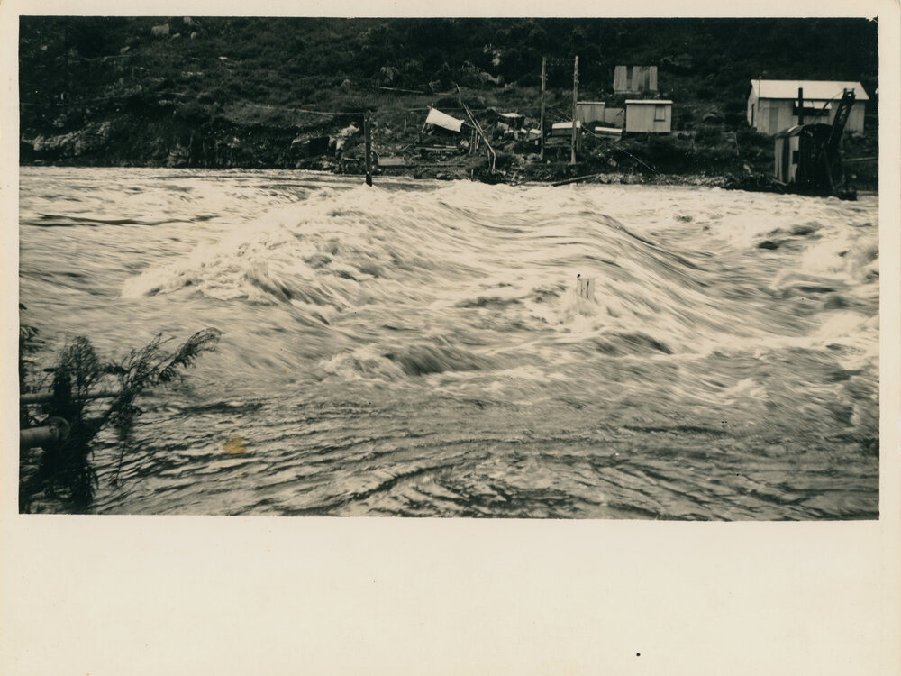 Flood waters throughout the Somerset Dam construction site