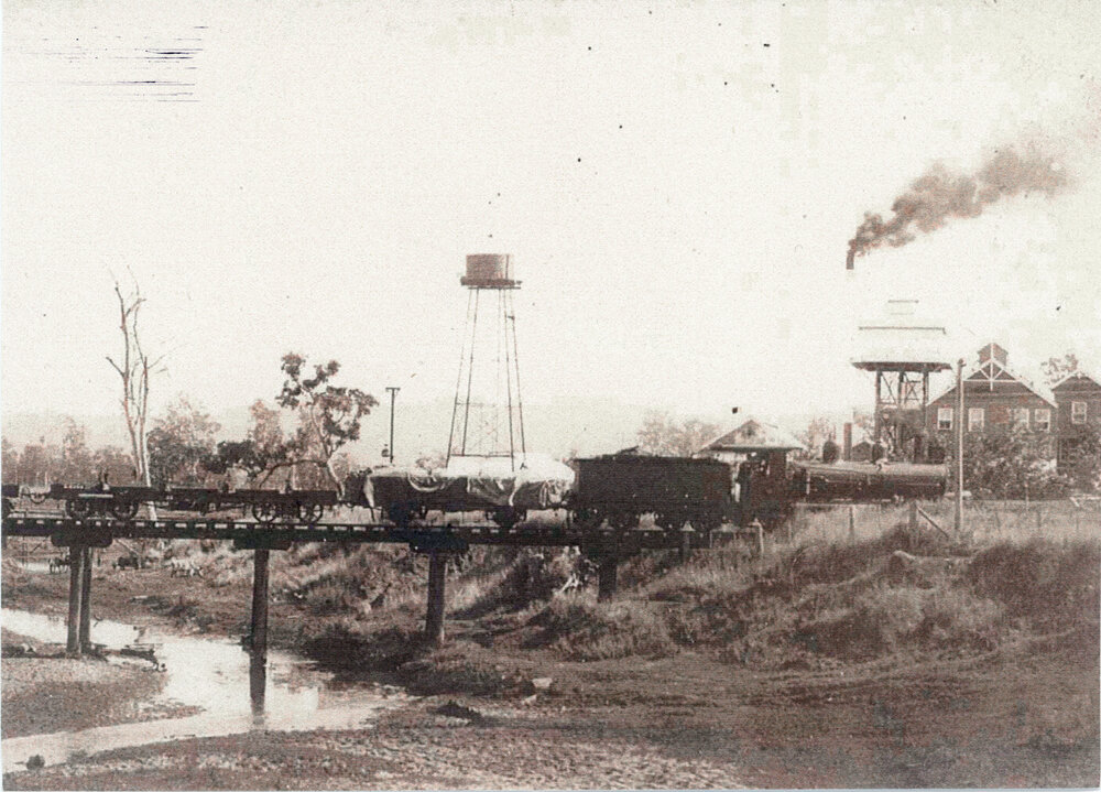 Train passing over Cressbrook Creek heading to the Toogoolawah condensery 
