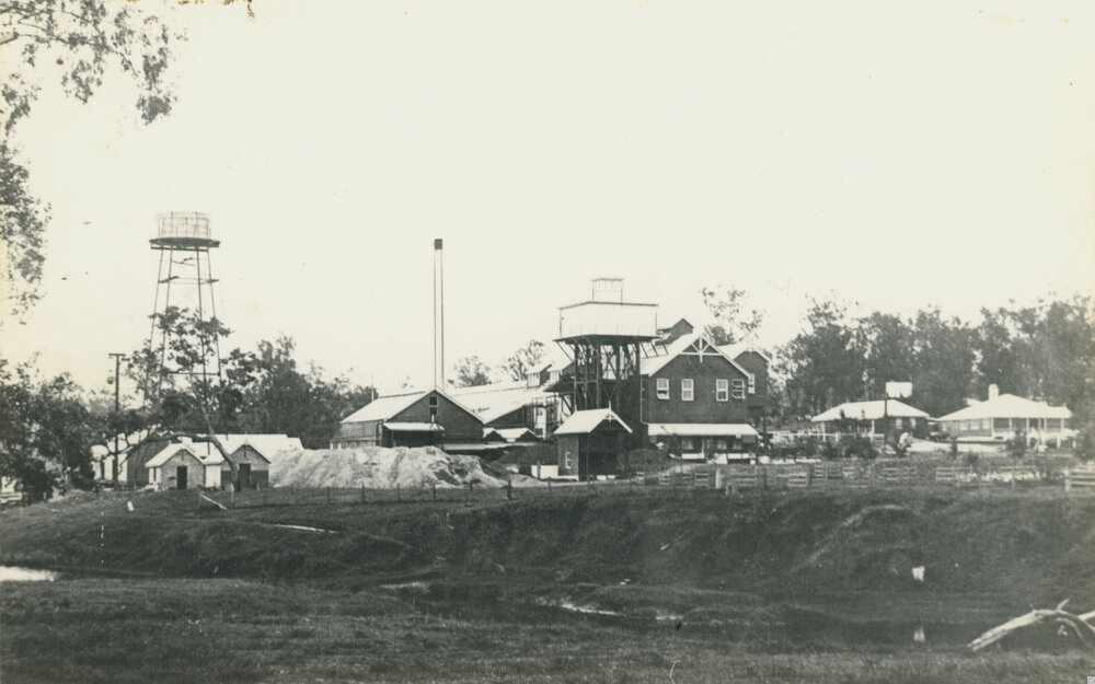 Nestle condensed milk factory with steel chimney and factory houses