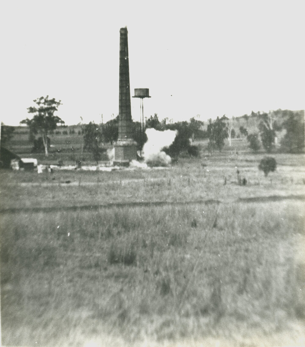 Demolishing the brick chimney