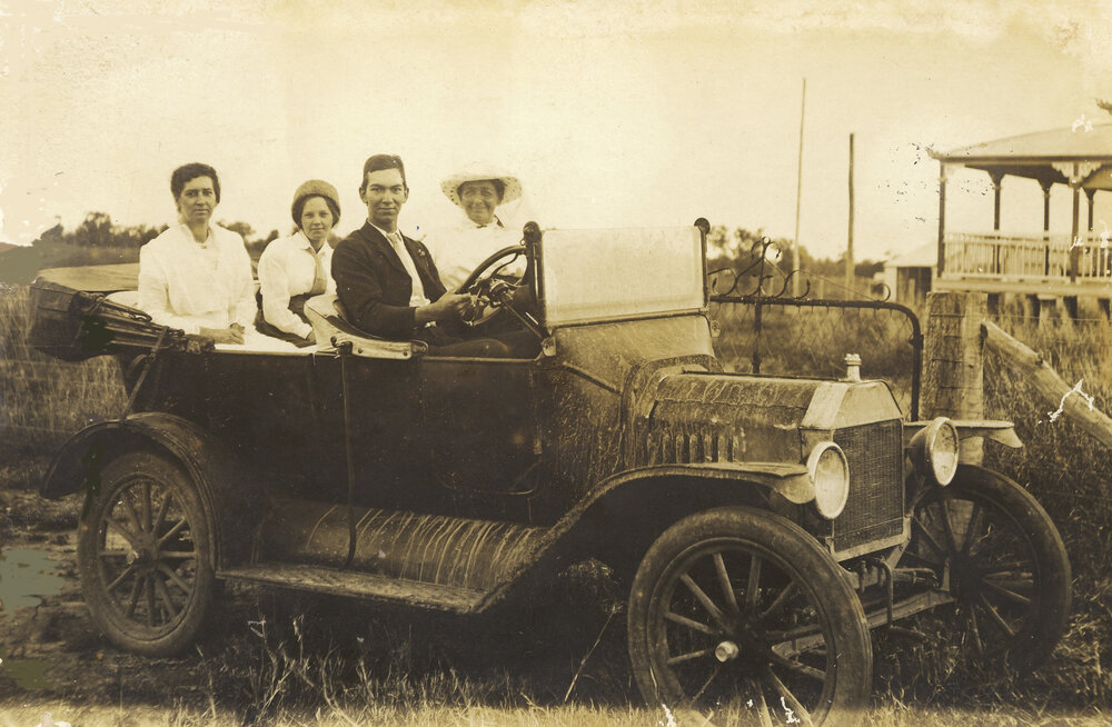 Eddie Kirby with mother and sisters in a car