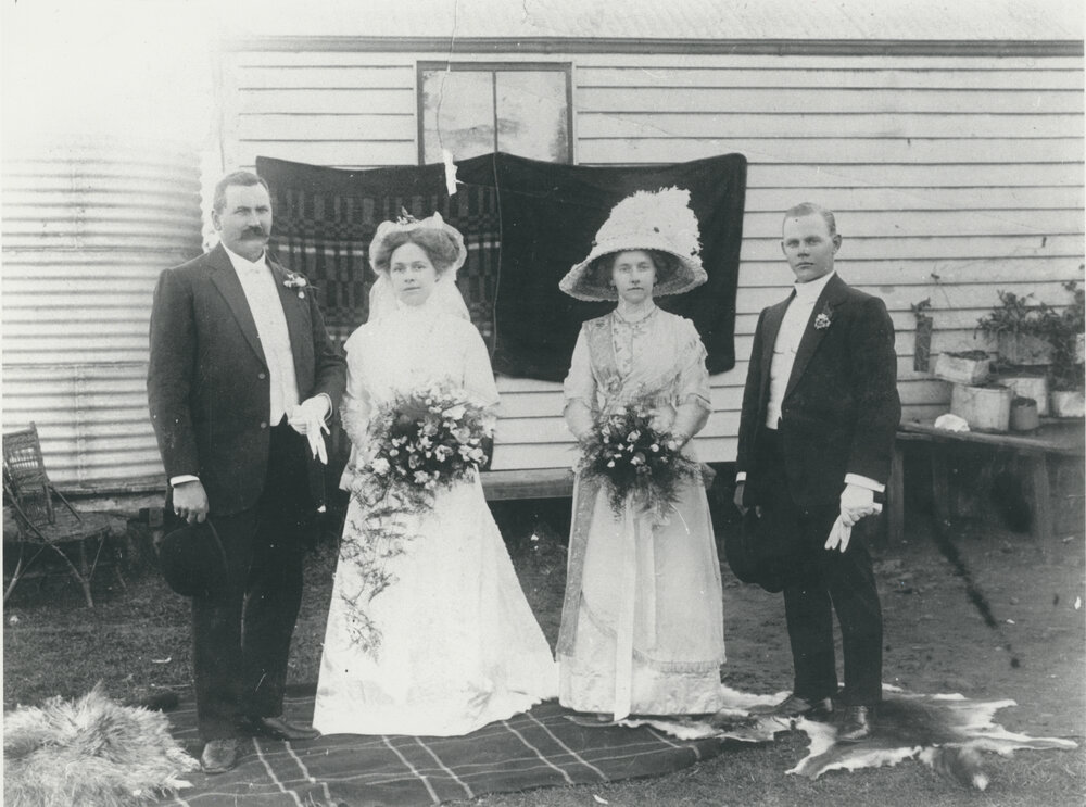 Herman Lindemann and Esta Jensen's wedding, with her sister Elvira and brother Arthur.