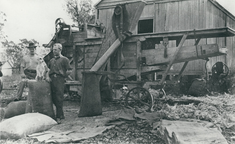 A corn sheller on a farm in Lowood