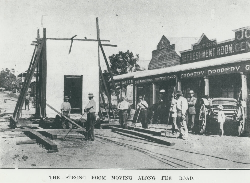 The Bank of Queensland's strongroom being moved along the road