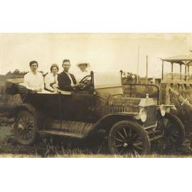 Eddie Kirby with mother and sisters in a car