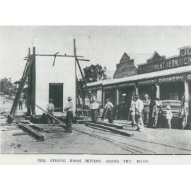 The Bank of Queensland's strongroom being moved along the road