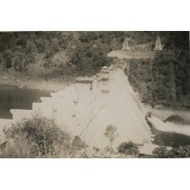 Somerset Dam wall as water gushes from pipes