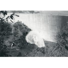 Valves at work as water gushes out of the pipes in the Somerset Dam wall