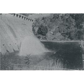 Valves at work as water gushes out of the pipes in the Somerset Dam wall