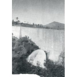 Valves at work as water gushes out of the pipes in the Somerset Dam wall