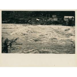 Flood waters throughout the Somerset Dam construction site