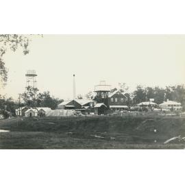 Nestle condensed milk factory with steel chimney and factory houses