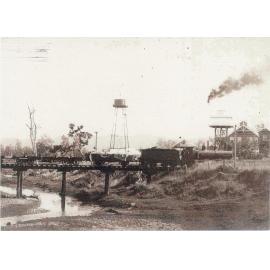 Train passing over Cressbrook Creek heading to the Toogoolawah condensery 