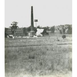 Demolishing the brick chimney